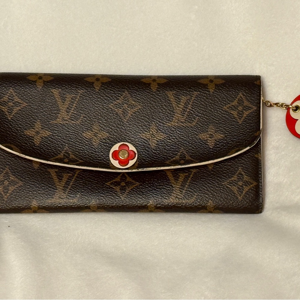 COA included! Louis Vuitton Emilie Monogram Wallet with Red Accents